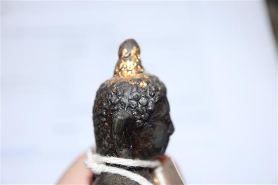 A 17th century Chinese gilded bronze Buddha, H.10.5cm
